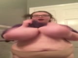 Teen with enormous boobs and glasses