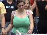 Busty babe filmed on the streets