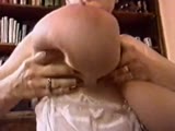 Toni sqeezing her boobs